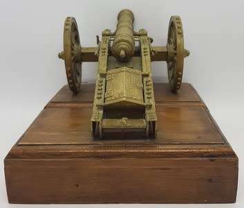 Plastic Model Canon on wooden stand - as per photo