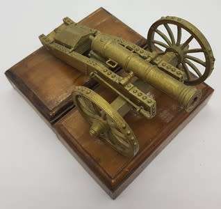 Plastic Model Canon on wooden stand - as per photo