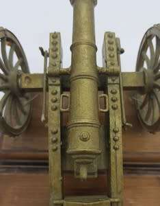 Plastic Model Canon on wooden stand - as per photo
