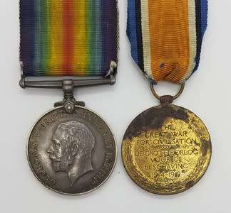 Pair of WWI Victory and War Medals issued to: PTE D. Du T. Loubser 1st SA Inf. BDE 14907 asp