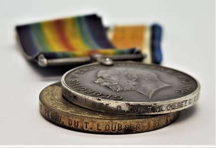 Pair of WWI Victory and War Medals issued to: PTE D. Du T. Loubser 1st SA Inf. BDE 14907 asp