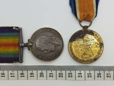 Pair of WWI Victory and War Medals issued to: PTE D. Du T. Loubser 1st SA Inf. BDE 14907 asp