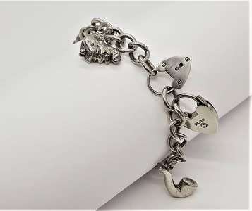 925 Sterling Silver Charm Bracelet weight 35,7g as per photo