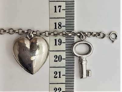 925 Sterling Silver Charm Bracelet  - 26.6g 19.5 cm - as per photo