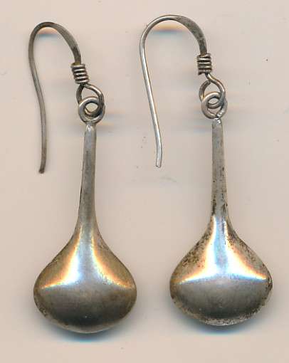 silver earrings as per scan