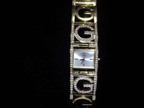 Ladies Guess watch working as per scan