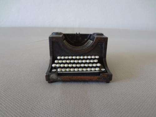 Typewriter pencil sharpener, as per scan