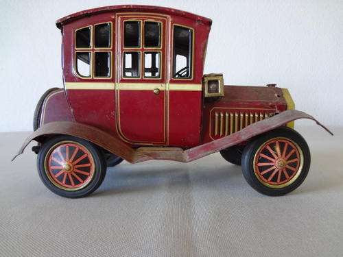 Old battery-operated toy car as per scan