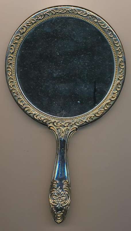 Vintage silver- plated hand held mirror, as per scan
