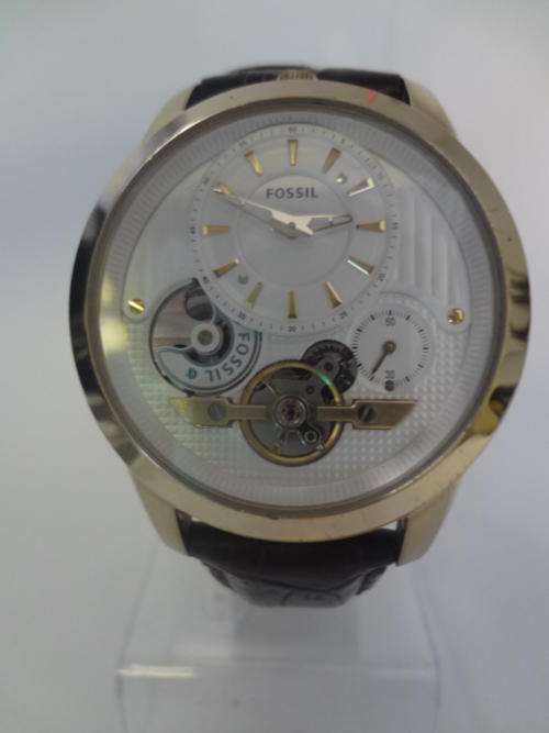 Gent's Fossil watch with leater strap, working as per photo