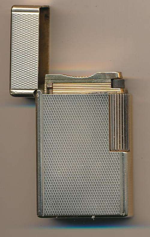 S.T. Dupont lighter, made in France, working as per scan