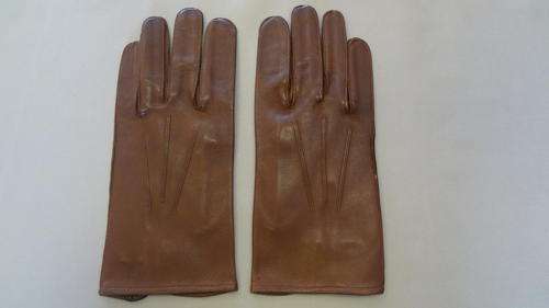 Pair of genuine leather gloves as per photo