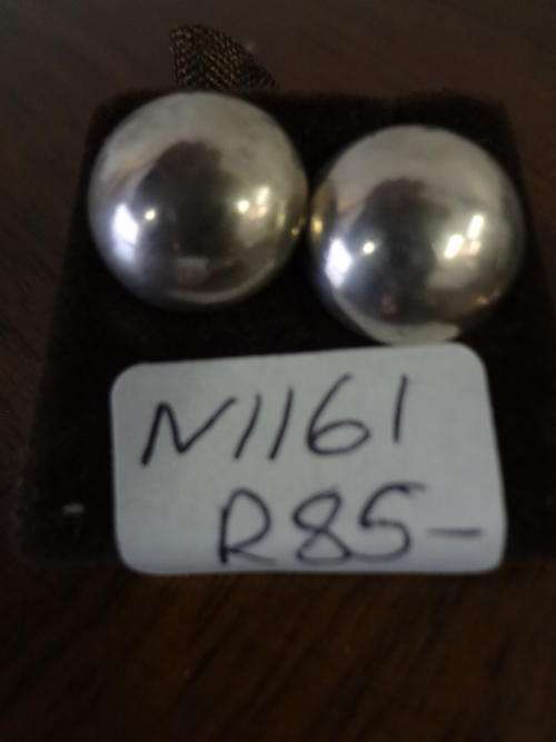 Silver earrings as per scan