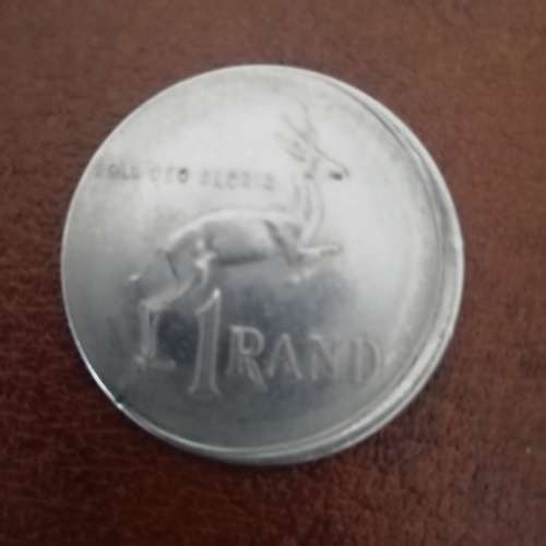 1977 R1 coin-damaged during minting