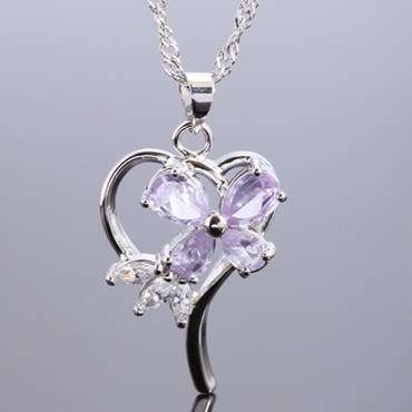 **STUNNING WHITE GOLD TANZANITE PEAR CUT PENDANT WITH CHAIN**