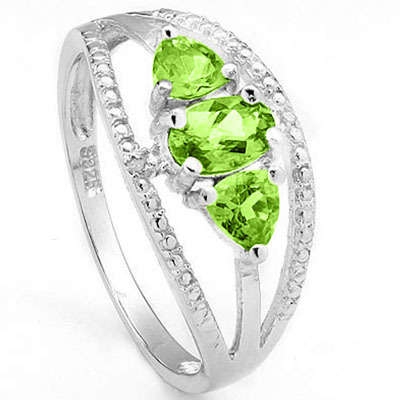 **STUNNING 0.7 CARAT OVAL CUT GENUINE PERIDOT SOLID SILVER RING**
