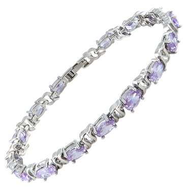 **STUNNING WHITE GOLD OVAL CUT TANZANITE TENNIS BRACELET**