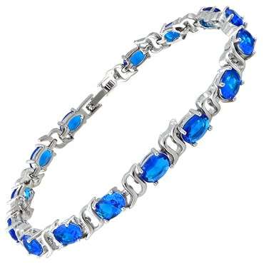 **STUNNING WHITE GOLD OVAL CUT BLUE SAPPHIRE  TENNIS BRACELET**
