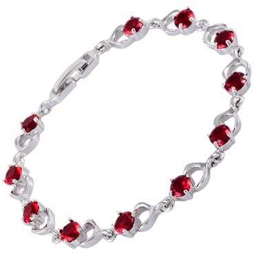 **STUNNING WHITE GOLD ROUND CUT RUBY TENNIS BRACELET**