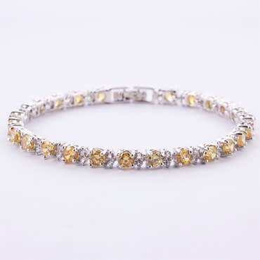 **STUNNING WHITE GOLD ROUND CUT YELLOW CITRINE TENNIS BRACELET**