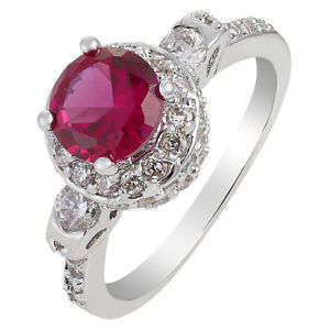 **STUNNING ROUND CUT RUBY RING SET IN 18CT WHITE ROLLED GOLD**