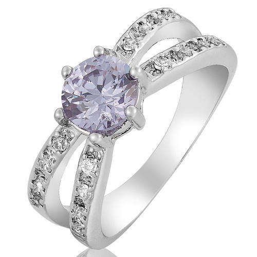 **CLASSIC WHITE GOLD ROUND CUT TANZANITE RING**