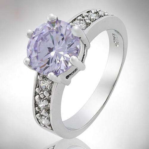 **CLASSIC WHITE GOLD ROUND CUT TANZANITE COCKTAIL RING**