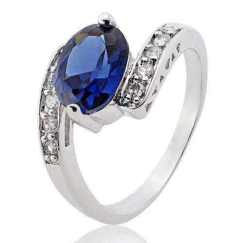 **CLASSIC WHITE GOLD OVAL CUT BLUE SAPPHIRE RING**