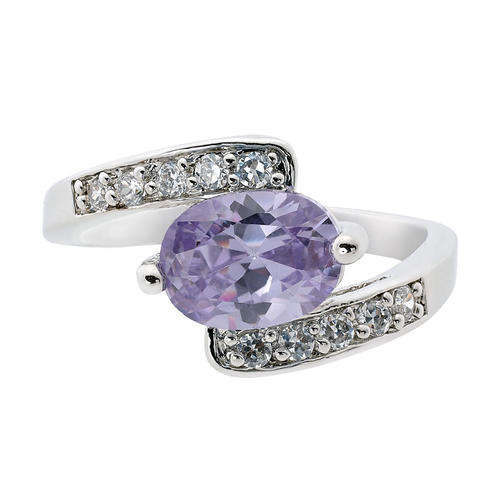 **CLASSIC WHITE GOLD OVAL CUT TANZANITE RING**