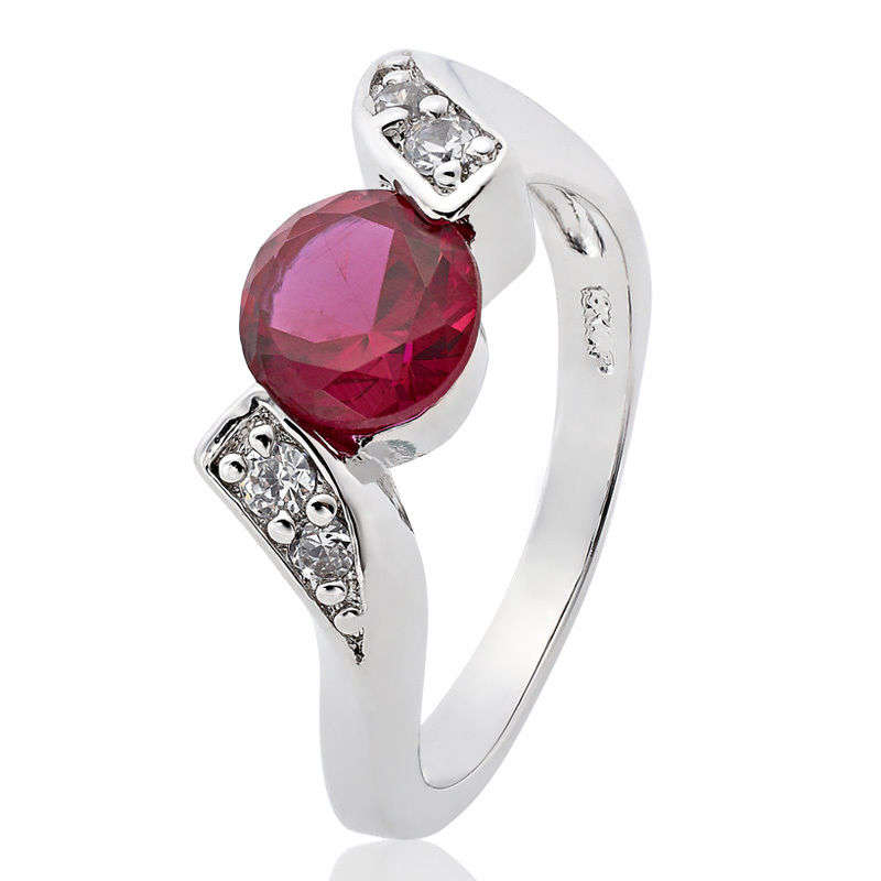**DESIGNER WHITE GOLD ROUND CUT GARNET RING**