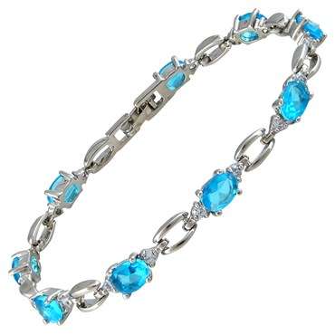 **STUNNING OVAL CUT AQUAMARINE  TENNIS BRACELET SET IN 18CT WHITE GOLD**