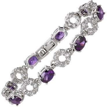 **STUNNING OVAL CUT PURPLE AMETHYST TENNIS BRACELET SET IN WHITE GOLD**
