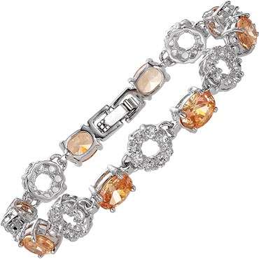 **STUNNING OVAL CUT CHAMPAGNE GEMSTONE TENNIS BRACELET SET IN 18CT WHITE GOLD**