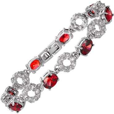 **STUNNING OVAL CUT RED RUBY TENNIS BRACELET SET IN WHITE GOLD**
