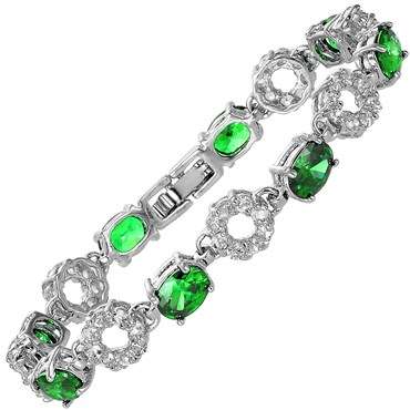 **STUNNING OVAL CUT GREEN EMERALD TENNIS BRACELET SET IN WHITE GOLD**