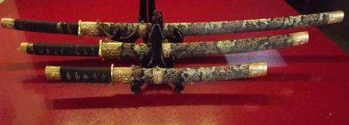 SET OF THREE SWORDS WITH GOLDEN DRAGON ON SCABBARDS from SUEZYT