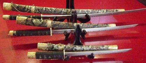 SET OF THREE SWORDS WITH GOLDEN DRAGON ON SCABBARDS from SUEZYT
