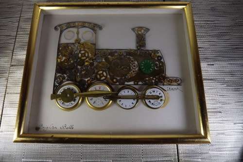 HOROLOGICAL COLLAGES BY L KERSH SET OF THREE MADE FROM CLOCK PARTS from SUEZYT