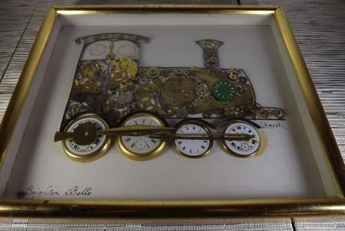 HOROLOGICAL COLLAGES BY L KERSH SET OF THREE MADE FROM CLOCK PARTS from SUEZYT