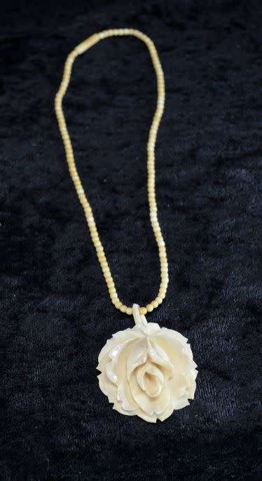 GENUINE IVORY FLOWER PENDANT WITH IVORY CHAIN AND 2 IVORY RINGS