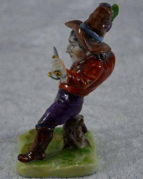 reserved for charles CONTINENTAL PORCELAIN HUNCHBACK WITH KNIVES -  from SUEZYT