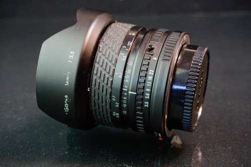 **Fisheye** Sigma 14mm F3.5 Fisheye Lens in Canon FD Mount  **Excellent Condition**