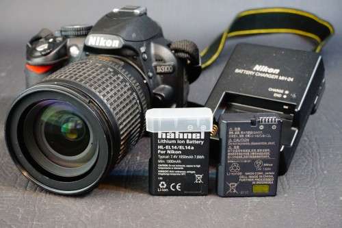 Nikon D3100 14.2MP DSLR Camera with Nikkor 18-135mm F3.5-5.6G IF-ED Lens and 2 Batteries