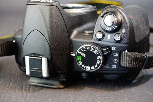 Nikon D3100 14.2MP DSLR Camera with Nikkor 18-135mm F3.5-5.6G IF-ED Lens and 2 Batteries