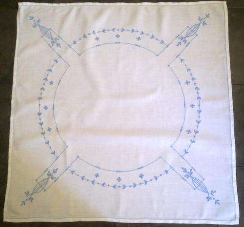 Vintage white tablecloth with blue embroidery