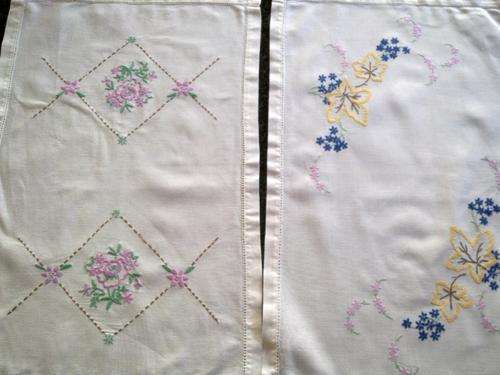 Two hand embroidered white Irish linen tray cloths