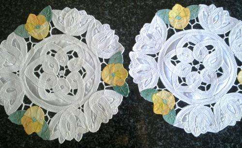 Two satin hand made lace doilies / mats