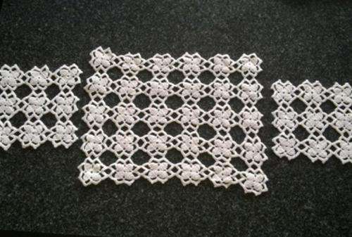Three off-white cotton crochet doilies