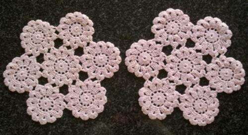 Two soft pink cotton crochet doilies 23cm