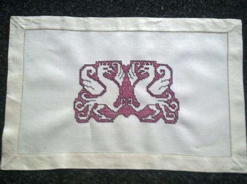 Irish linen tray cloth with cross stitch griffins